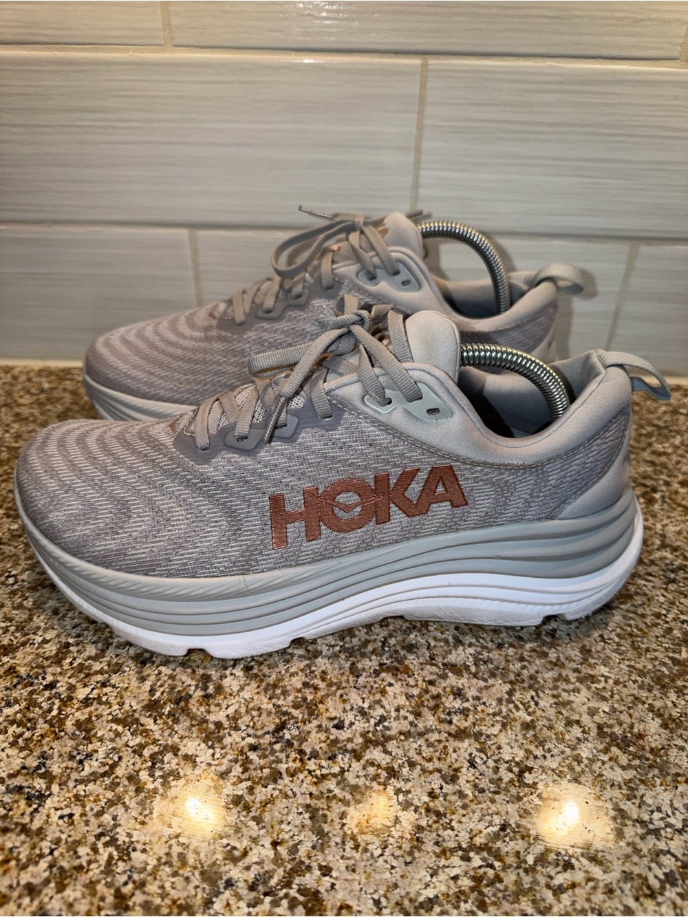 Hoka Light Gray Running Shoes with Rose Logo